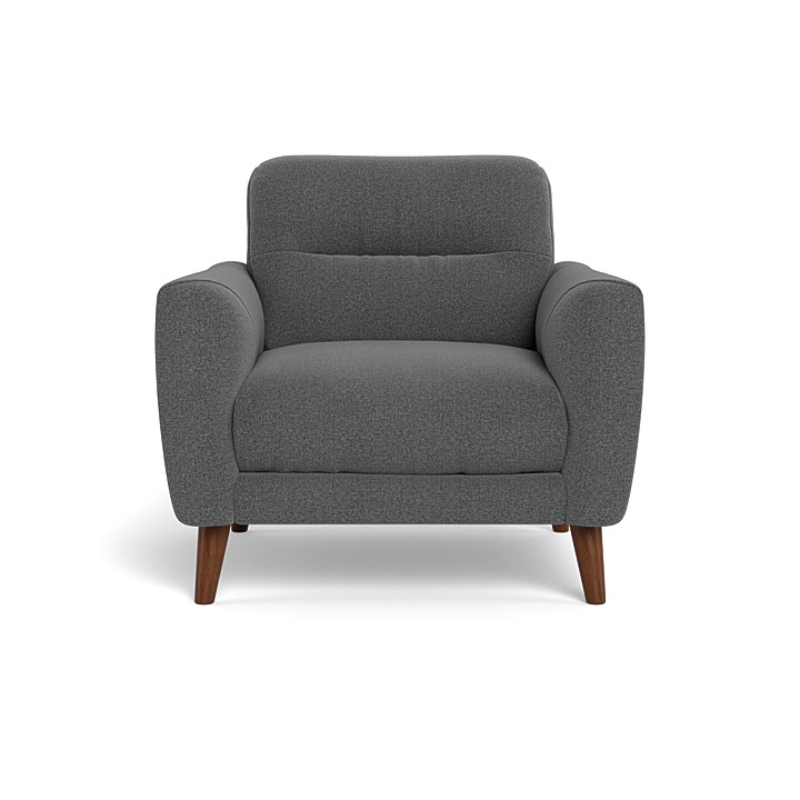 teal armchair with footstool