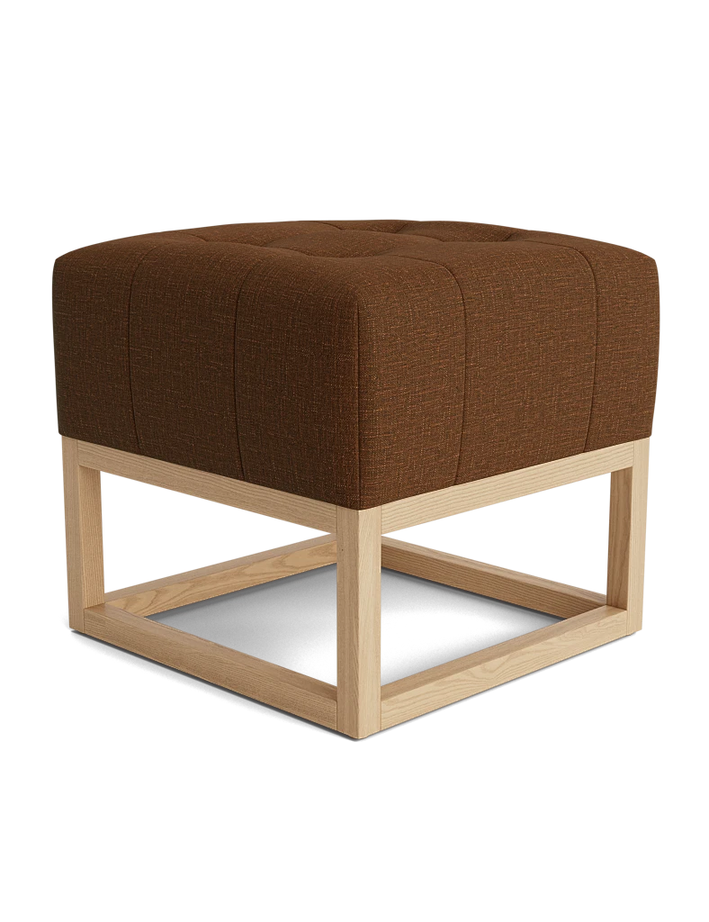 Chocolate brown tufted square ottoman with a light wood frame.